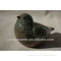 ceramic bird figurine